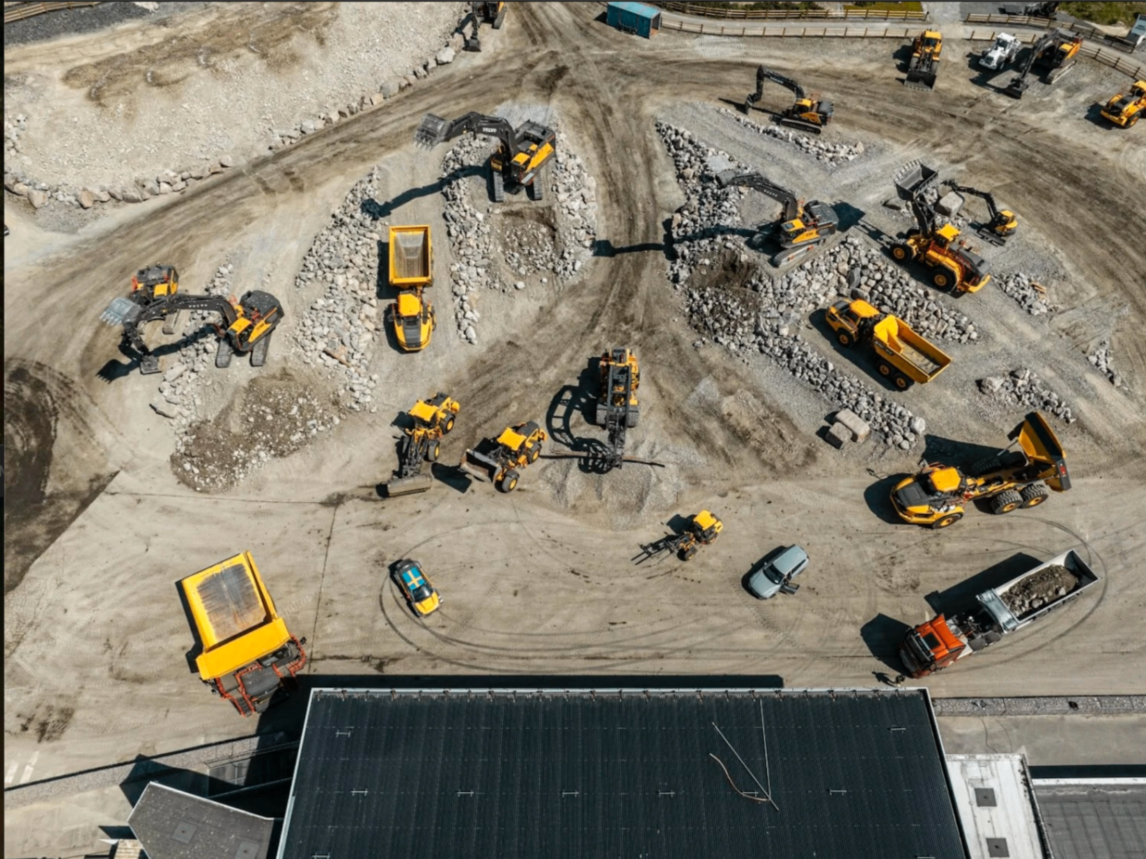Quarry photo highlighting fleet of Volvo machinery